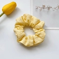 Chic yellow ballet-style scrunchie with soft pleated texture for a sweet hair look - Yellow Cream Scrunchie
