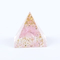 Pink crystal pyramid resin ornament with gold foil flakes on white background - Rose Quartz