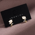 Boucles d'oreilles rose en émail blanc avec finition dorée et détails en zircon - Argent 925 / Or Blanc (ES2406)