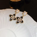 Vintage gold clover earrings with black enamel and pearl details in luxury style - Four-Leaf Clover Square Pearl Pendant Earrings