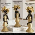 Three-piece set of black resin goddess figurines with gold floral accents and checkered skirts - Elegant Black Woman - Large Size 8768 Set Of Three