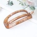 Square amber leopard print hair clip with hollow design in matte acrylic finish - Jelly Brown