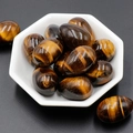 Polished tiger eye stone egg-shaped gems in a white hexagonal ceramic bowl - Tiger's Eye (1pc)