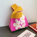 Knit wrist bag featuring a bold yellow and pink contrast with white floral patterns - Small Flowers On A Rose-red Background