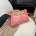 Pink crocodile-embossed underarm baguette bag with smooth faux leather finish - Pink