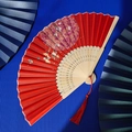 Classical red folding bamboo fan with gold floral patterns and red tassel accessory - Red Flower Butterfly