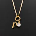 Stainless steel initial necklace with letter p and rhinestone pendant in gold finish - Letter P (XNL0103)