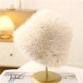 Plush faux fur Mongolian hat in cream white displayed on a stylish metal stand - M (56-58cm) / Beige
