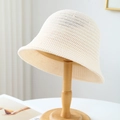 Chic cream white knitted bucket hat for women on a wooden stand with soft lighting - M (56-58cm) / Solid Knit Style (5652) / White