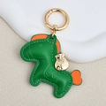Green leather horse keychain with orange mane and gold money bag charm accessory - Large / Green