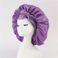 Purple satin hair bonnet with large bow detail for sleep care on a white model head - Medium Single Layer Ribbon / Leather Purple