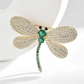 Exquisite dragonfly brooch sparkling with crystal rhinestones and vibrant green stones for women. - Gold