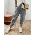 Detail of grey striped woven harem pants featuring elastic waist and breathable fabric - XS / Bottoms / Black