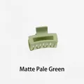 Detail of matte pale green hollow rectangular hair claw clip with a mini 4cm square design - Matte Pale Green
