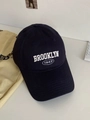 Detailed close-up of Brooklyn 1947 3D embroidery on navy blue cotton baseball cap - Black