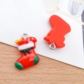 Red resin Christmas stocking charms with white cuffs and green bows for DIY jewelry - Red Christmas Sock