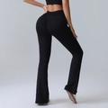 High-waisted black flare yoga pants with scrunched butt and V-shaped back waistband - S / Black