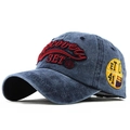 Vintage washed blue denim baseball cap featuring red letter embroidery and side patch - Washed Navy Blue (3ET)