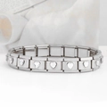 Macro view of stainless steel Italian charm bracelet with heart-shaped crystal links - Heart Transparent Gem (18 Links)