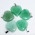 Set of five polished green heart-shaped crystal pendants with silver metal bails - Green Aventurine