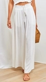 Detail of white wide-leg trousers featuring elastic high waist and drawstring design - S / White