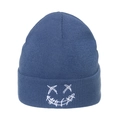 Close-up of white face embroidery on dark blue knitted beanie with ribbed texture - M (56-58cm) / Blue