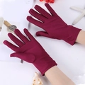 Close-up of wine red spandex gloves with elastic wrist stitching and slim fit design - One Size / Burgundy