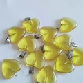 Multiple yellow heart-shaped crystal pendants with metal loops for DIY jewelry making - Yellow Glass