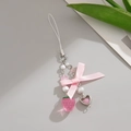 Detail of pink bow phone charm with strawberry and heart pendants on a silver metal chain - Pink Strawberry Artificial Pearl Style (0217)