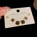 Three-piece set of star pearl and black floral earrings on jewelry display card - Gold-Four-Leaf Flower Set (125#)