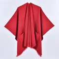 Chic red hooded poncho for women featuring front pockets and decorative tassel trim - Single Color with Pocket and Frayed Edge / Red