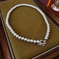 Detail of grey pearl necklace with metallic OT toggle clasp on vintage velvet tray - Grey (8mm Pearl)