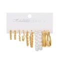 5-pair gold alloy earring set with twisted hoops, chains, and faux pearls on display - 31kc Gold S15