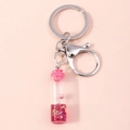 Pink mushroom wishing bottle keychain with glitter liquid and pink cap on pink background - Red Mushroom (YZ130hongse)