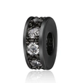 Close-up of a black copper rondelle spacer bead with white zircon stones on white background - Gunmetal Base White Zircon