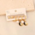 Detail of stainless steel earring set with pearls and moon star charms on cards - Style 1 Moon