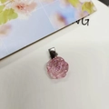 Close-up of a pink resin camellia flower hair clip with silver metal duckbill clip detail - Iridescent Pink
