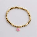 Bracelet perles dorées minimaliste avec breloque œil porte-bonheur en émail rose - Rose