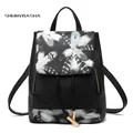 Women black fashion backpack with white feather pattern and gold zipper detail - Feather Black