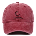 Close-up of Loading embroidery on a burgundy washed cotton vintage baseball cap - Adjustable / Burgundy