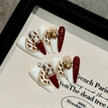 Handmade stiletto press-on nails with red leopard print and gold star accents - Large (L) / 182-Long Stiletto