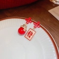 Detailed shot of festive red mahjong and fortune cat earrings on a white plate - Lucky Cat Mahjong Asymmetric Style (2# Silver Earring Post-Gold-Red)