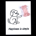 Dog bone shaped rose quartz crystal stone on a decorative Happiness is simple card - Rose Quartz