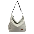 Light gray large capacity tote bag with adjustable black shoulder strap and side pockets - Light Green