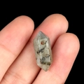 Green natural stone hex prism pendant bead with black mineral spots and central drill hole - Labradorite