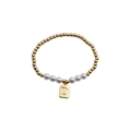 Detail of gold beaded bracelet featuring white pearls and a square letter D pendant - Letter D