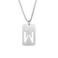 Macro shot of silver letter W cut-out pendant on a box chain stainless steel necklace - Letter W