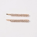 Detail of two gold-toned hair clips featuring a single row of sparkling clear rhinestones - KC Gold (White Rhinestone)