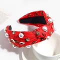 Close-up of red fabric knotted headband with pearl and rhinestone embellishments - Red (Baseball)