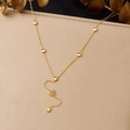 Detail of gold Y-shaped necklace with heart pendant, zircons, and elegant tassel chain - Pave Heart with Zirconia Tassel Style (N4113)
